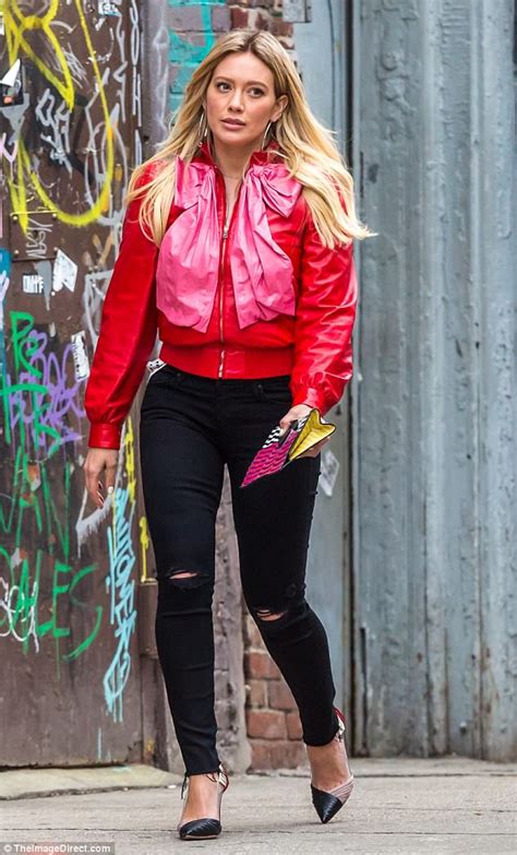 hilary duff stands out in scarlet and pink jacket in nyc