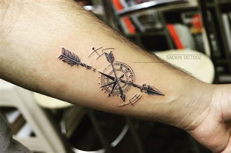 arrow with compass tattoo done by sachin arrow compass tattoo arrow