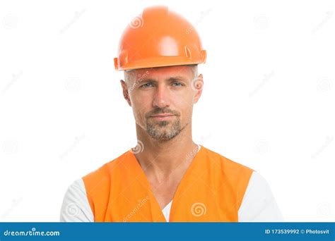 Man In Helmet Wear Construction Helmet On Building Site Builders