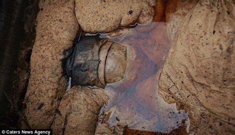 road workers find eerie coffin with 700 year old mummy