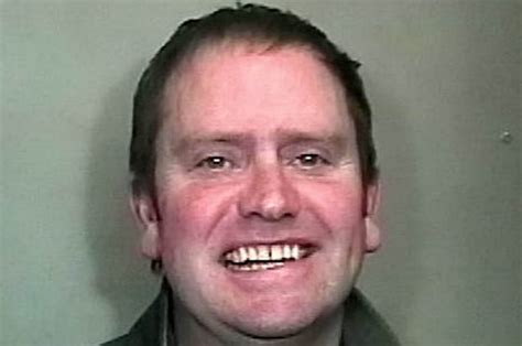 most sinister police mugshot photo shows serial rapist grinning ear to ear daily star