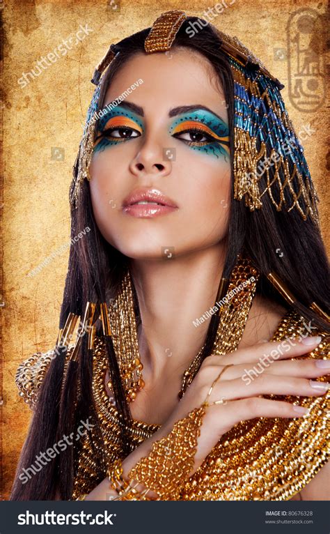 Beautiful Egyptian Woman Like Cleopatra On Egyptian Background Stock