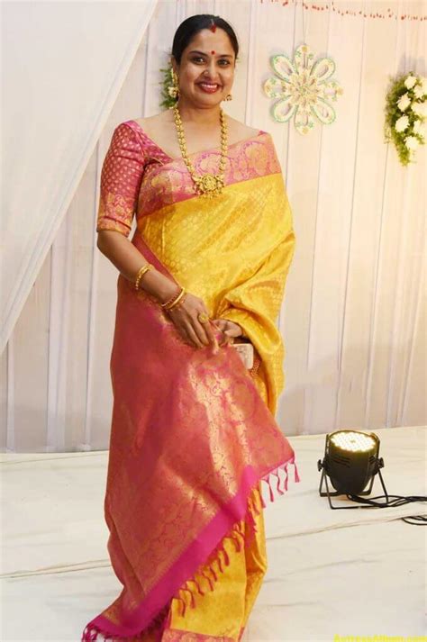 Movie Actress Pragathi Hot Photos In Yellow Saree