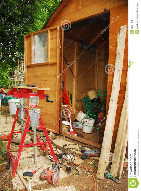 carpenter  work bench  messy garden shed stock image