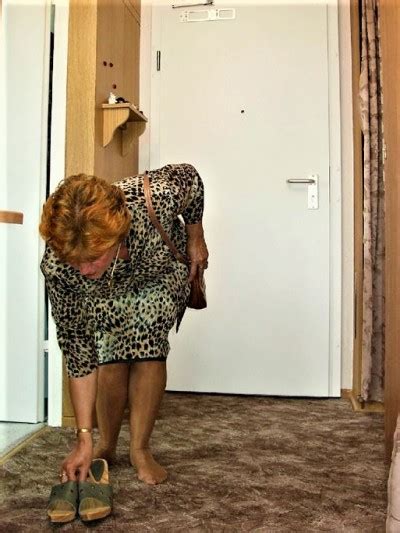 a very polite older woman she arrives and slips o tumbex