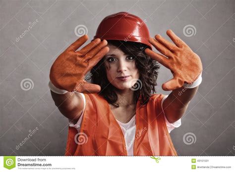 Girl In Safety Helmet Showing Stop Sign Stock Image