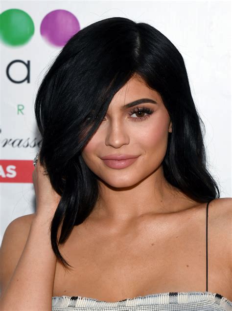 kylie jenner oozes sex appeal as a redhead in racy braless picture