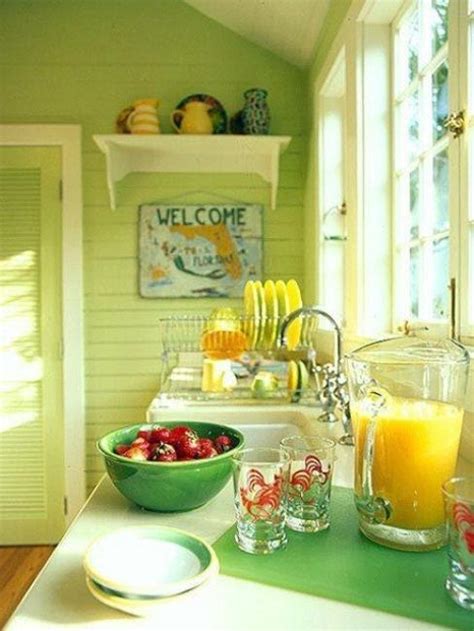 small kitchen designs  yellow  green colors accentuated  red  light blue