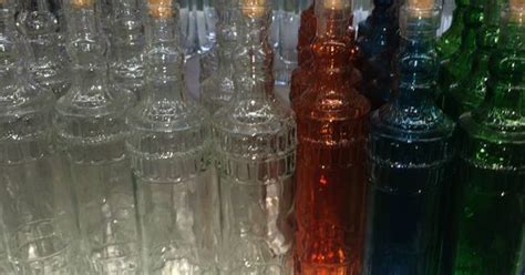 Glass Bottles With Corks In Various Colors From The Dollar Tree