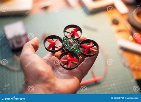 micro drone  hand stock image image  black equipment