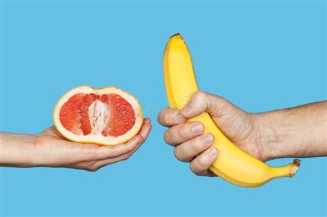 Erotic Banana And Donut In The Hands As A Symbol Of The Penis And