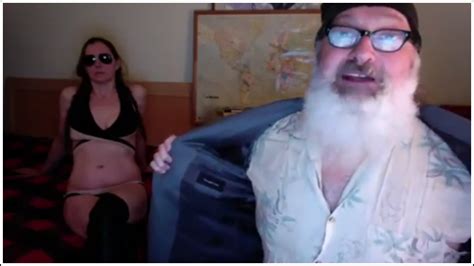 randy quaid performs fake sex act on wife in protest pop