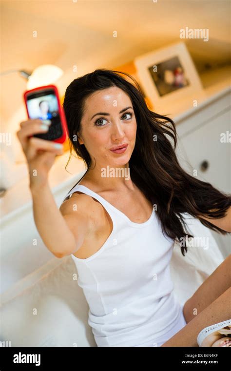 A Pretty Young Woman Girl In Her Underwear Taking A Sexy Selfie Photo