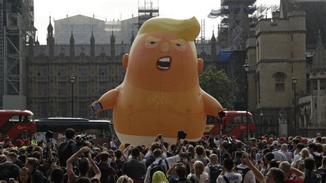protesters rally against president trump in uk