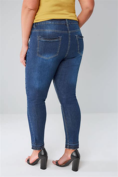 indigo rip and repair skinny ava jeans with raw cuffs plus