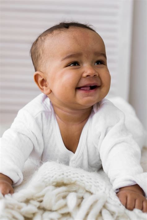 adorable  african american baby boy laughing black people