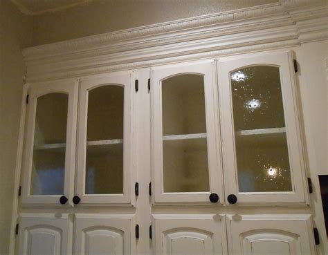 diy changing solid cabinet doors  glass inserts simply