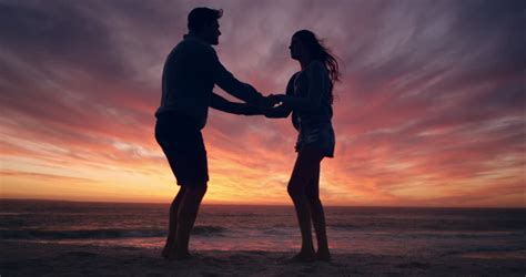happy couple dancing on beach stock footage video 100