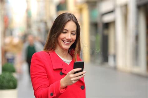 girl texting on a mobile phone at home stock image image of holding cellphone 64994265