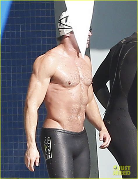 zac efron goes shirtless for baywatch swimming lessons