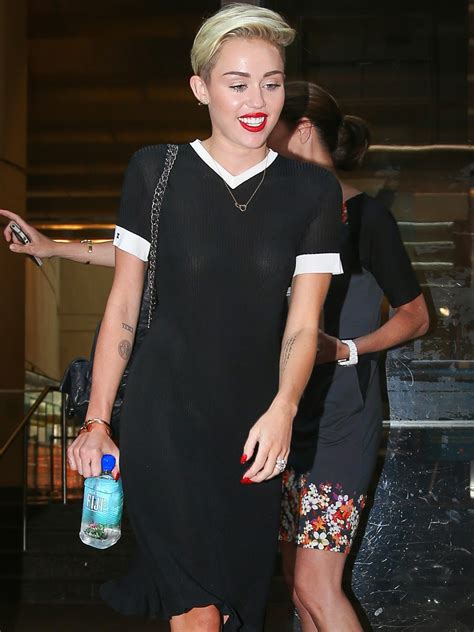 miley cyrus braless in see through dress paparazzi oops paparazzi oops