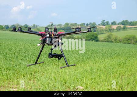 dji  octocopter uav drone   ground stock photo alamy