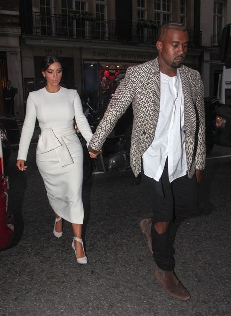 Kim Kardashian And Kanye West Look Miserable As They Dine