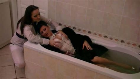Full Clothed Couple Of Milfs Take Bath Together Water Fetish Session