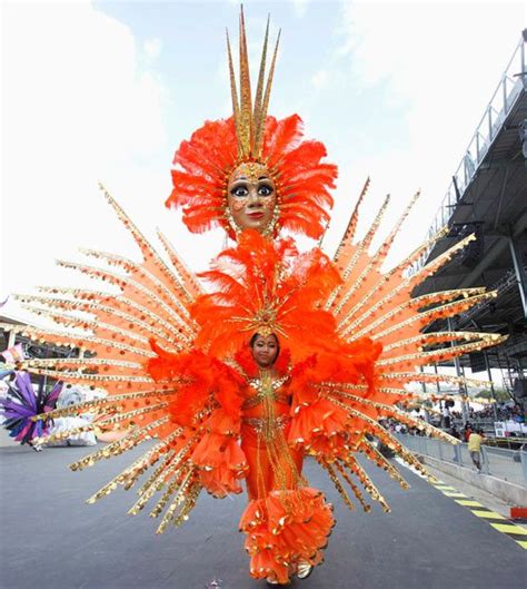 Carnival Season Costumed Revellers Parade In Trinidad