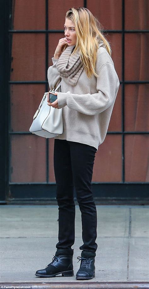 Jessica Hart Covers Up In Baggy Sweater And Skinny Jeans In New York