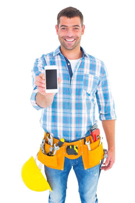 portrait  smiling handyman showing mobile phone stock image image  maintenance manual