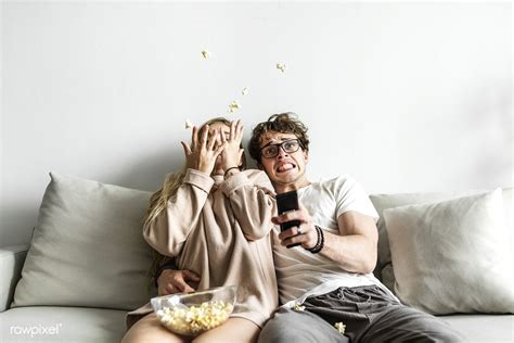 Couple Watching Movie At Home Together Premium Image By