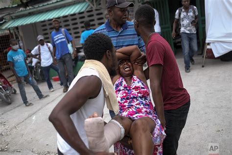 Tensions Grow In Haiti Over Slow Pace Of Aid After Quake — Ap Photos