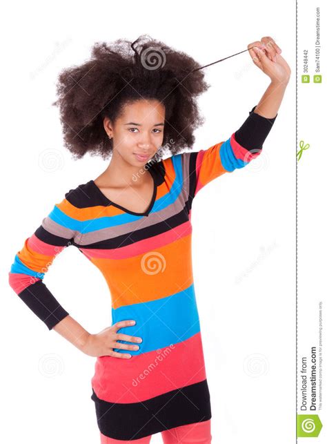 black african american teenage girl holding her afro hair