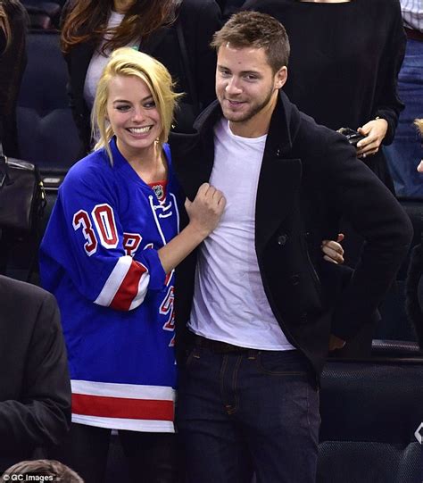 margot robbie hints at marriage to british director tom ackerley with