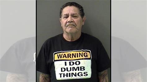 texas dwi suspect wears i do dumb things t shirt in mugshot abc7