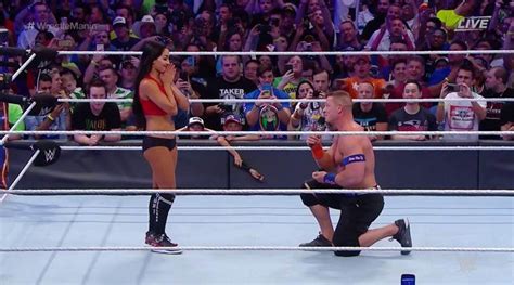 wwe wrestlemania 33 john cena proposes to nikki bella in the ring