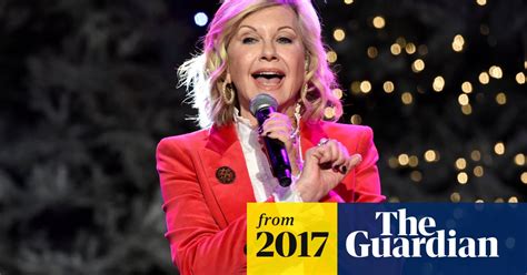 olivia newton john puts tour on hold after breast cancer diagnosis