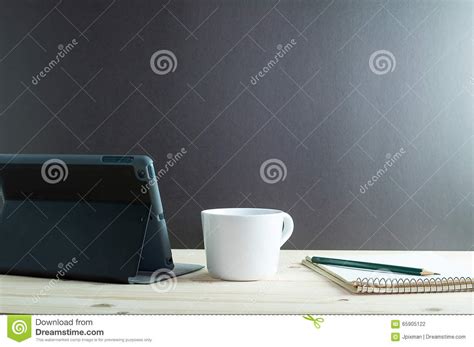 ipad mini  coffee  wooden desk stock photo image  background gray