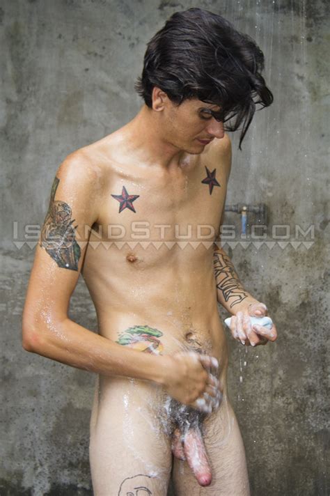 tattooed emo niko strips off naked showing his full bush of black dick hair on a thick uncut