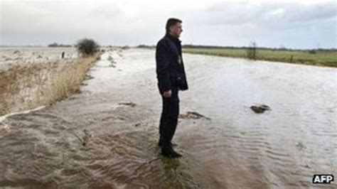 storms flooding prompt dutch evacuations bbc news