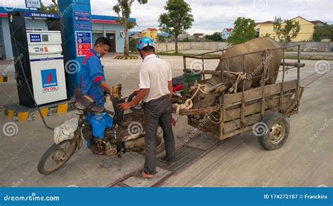 motorbyke pulling  trailer      gas pump editorial