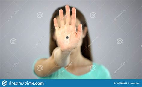 Black Dot On Womans Hand Secret Sign Of Domestic Violence Victim