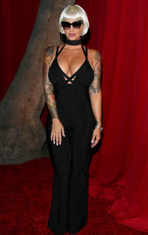 amber rose looks unrecognisable rocking blonde wig and mind blowing