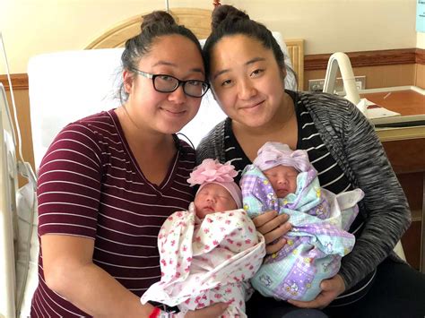 identical twin sisters give birth on same day after miscarriages