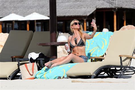 sarah harding busty in tiny monochrome bikini at a beach porn pictures