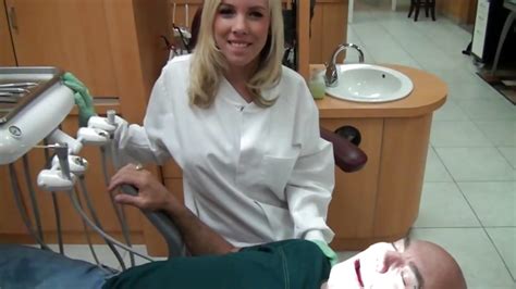 dentist britney beth gives her patient a prick sucking