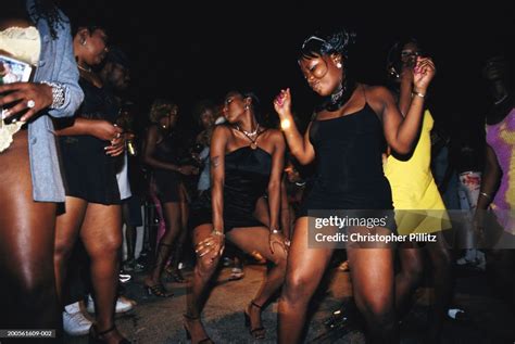 Jamaica Kingston Group Of Women Dancing In Street Night News Photo