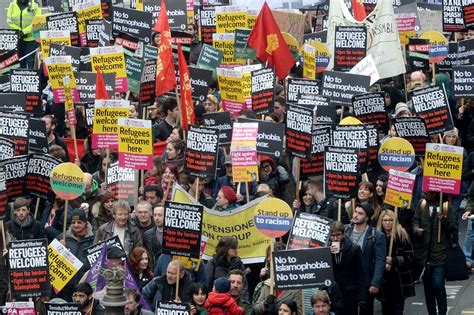 london protesters clash with police at refugees welcome march daily