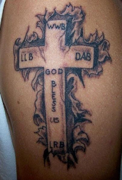 Skin Rip With Latin Cross Tattoo Tattooimages Biz